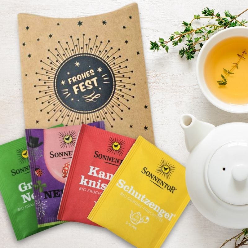 Weihnachtlich-winterliche Tee-Sets schön verpackt, Motiv: Frohes Fest