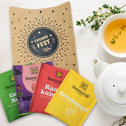 Weihnachtlich-winterliche Tee-Sets schön verpackt, Motiv: Frohes Fest